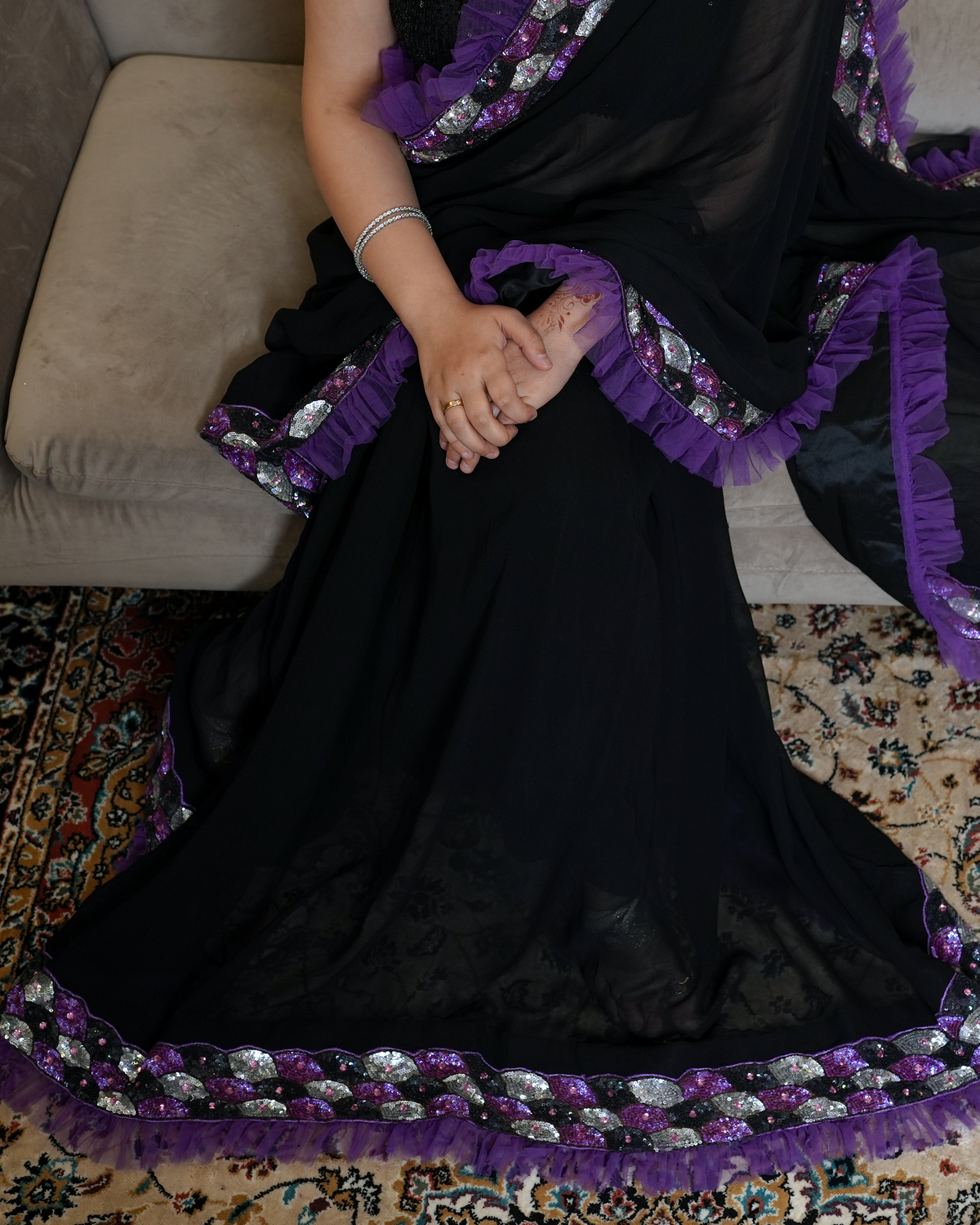 Zaria by House of Somarra — Close-up of the black drape and purple frill border.