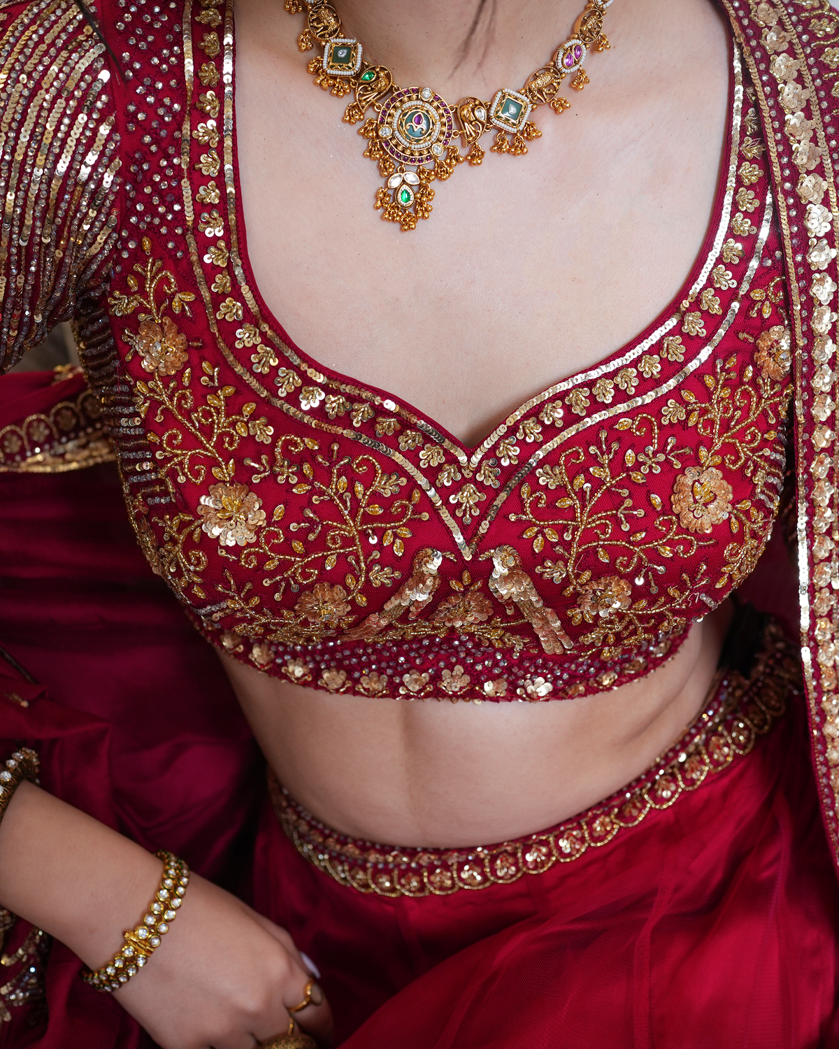 Afsana by House of Somarra — Close-up of the embroidered sweetheart neckline and blouse.