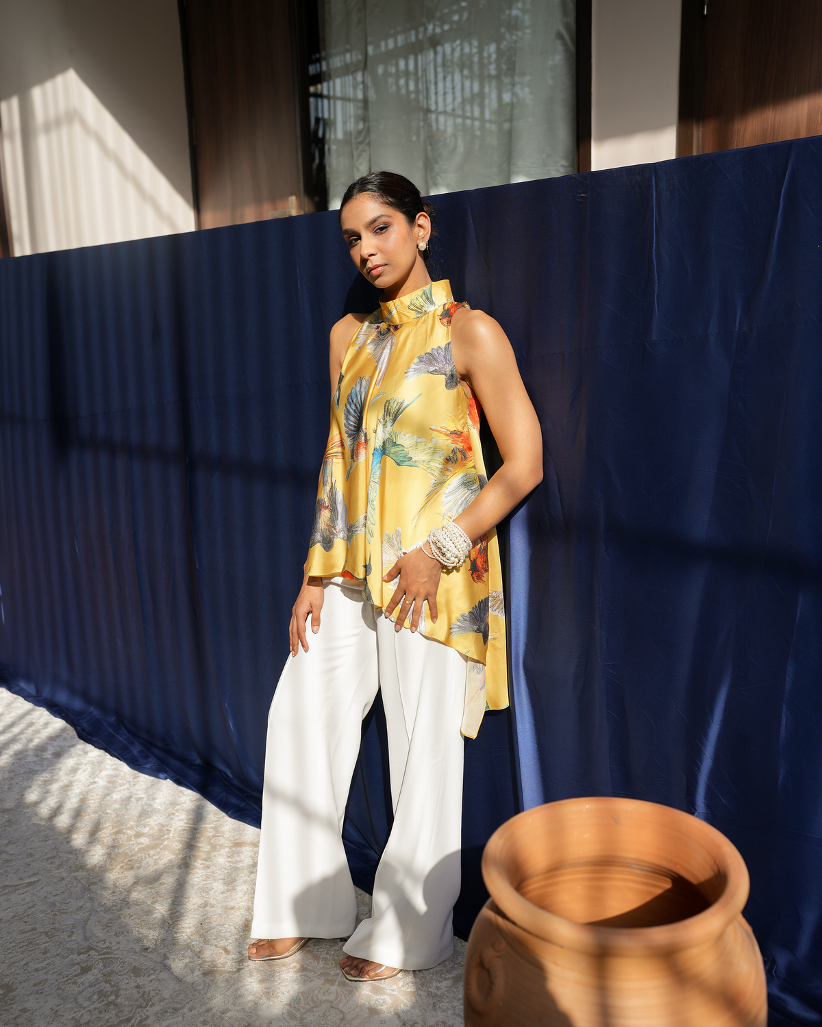 Jiya by House of Somarra — Full-length view showing the bird-print top and wide white trousers.