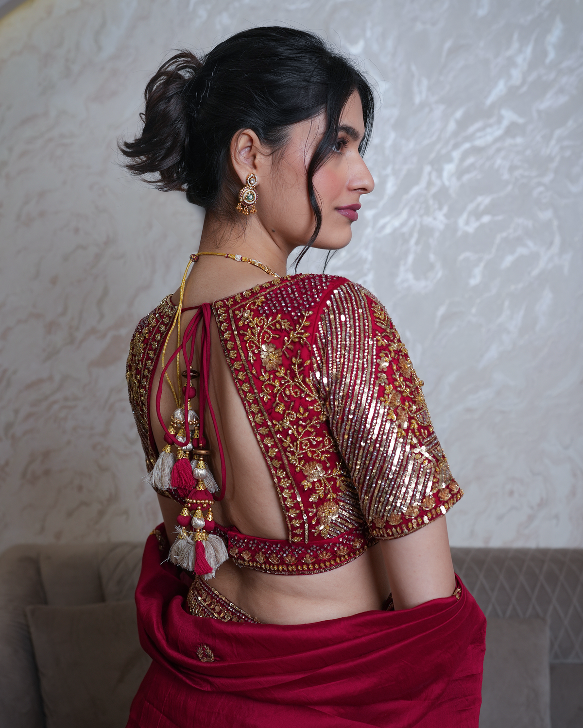 Afsana by House of Somarra — Back close-up of the blouse's tie fastening and sleeve embroidery.
