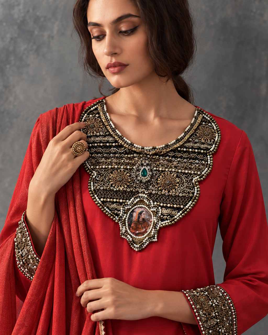 Aarika by House of Somarra — Close-up of the ornate neckline and embroidered sleeve cuffs.