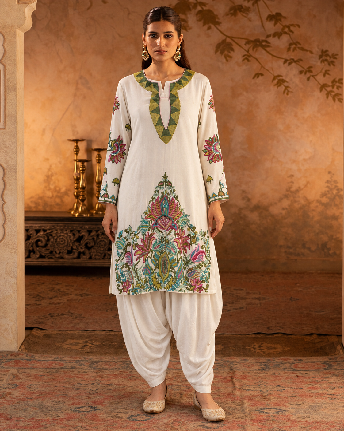 Vasantika by House of Somarra — Front view of the ivory embroidered kurta and draped dhoti trousers.
