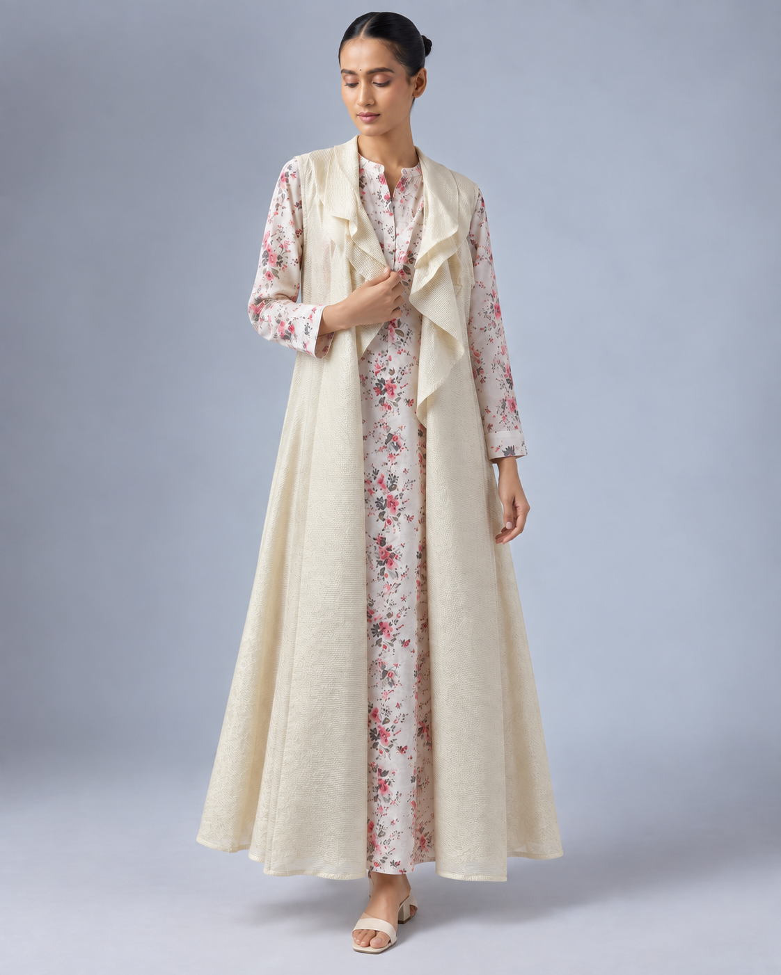 Varnika by House of Somarra — View showing the flowing open shrug over the floral ensemble.