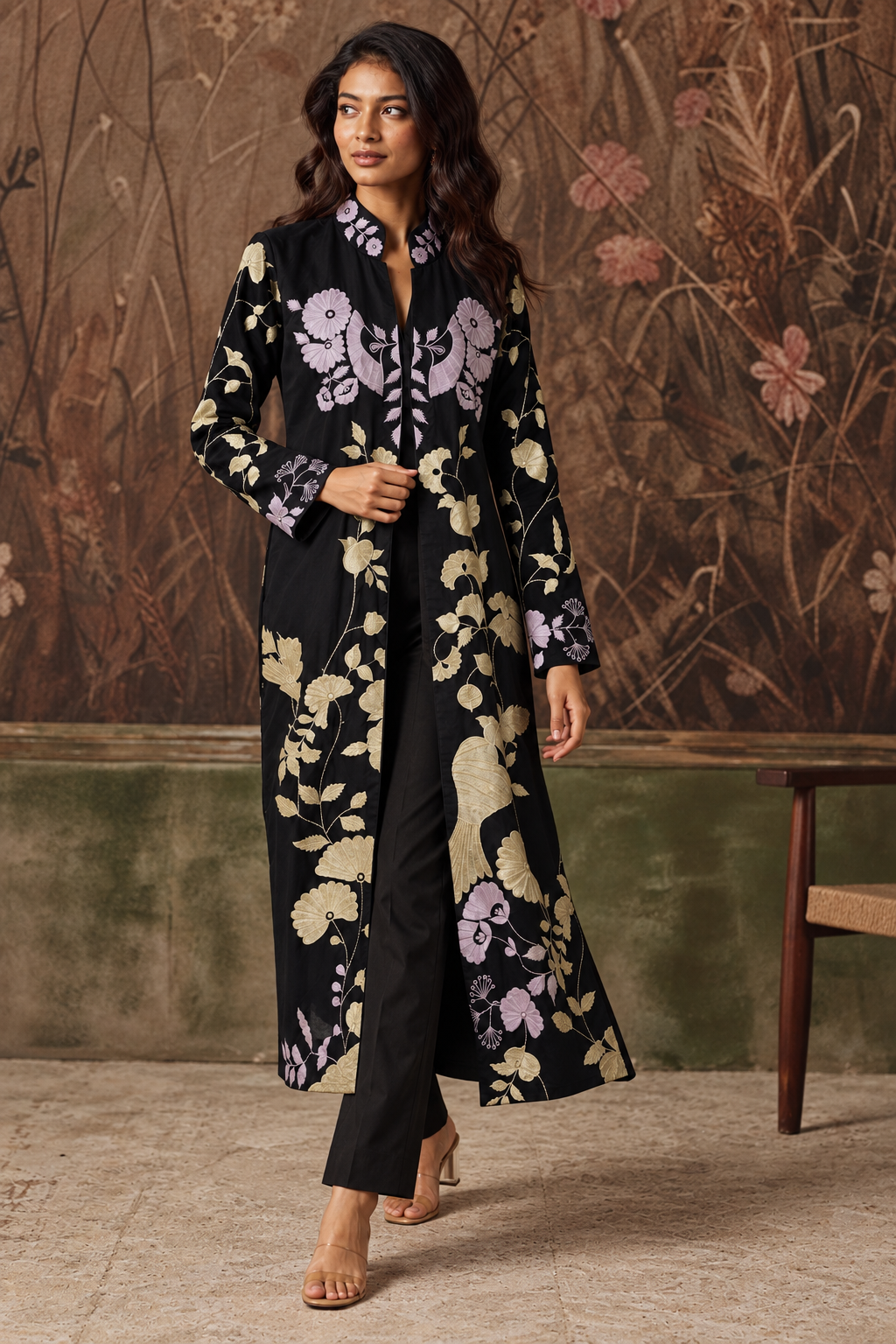 Hanami by House of Somarra — Walking view showing the embroidered botanical panels and black trousers.