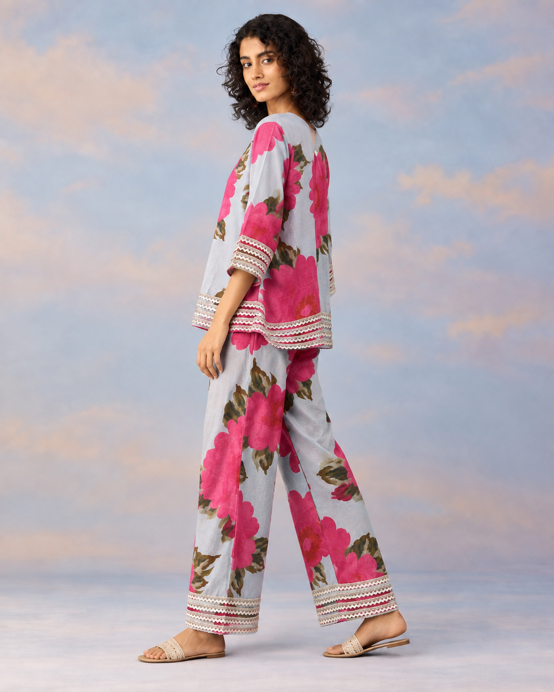 Gulaira by House of Somarra — Side view showing the pink floral print and matching trousers.