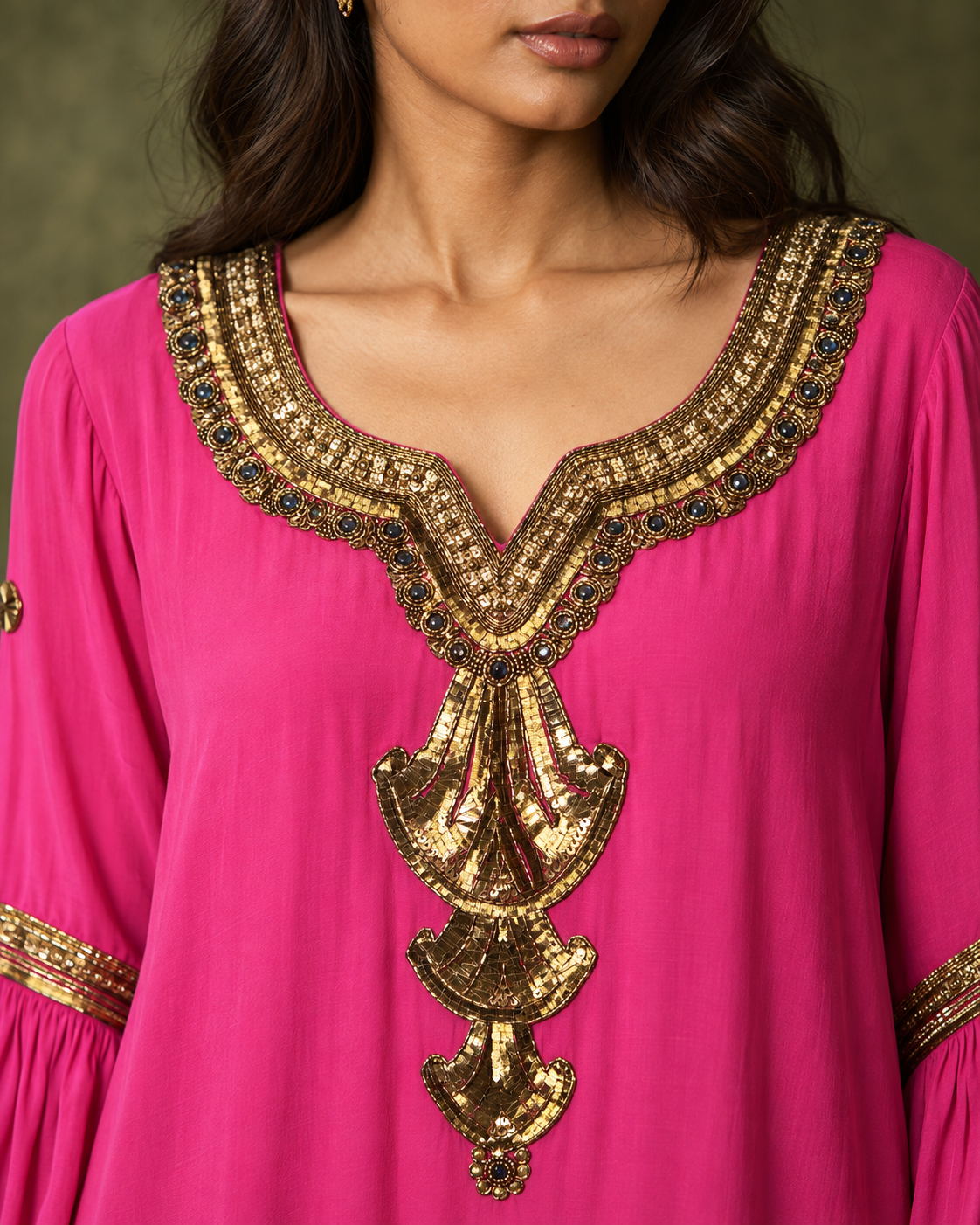 Amoli by House of Somarra — Close-up of the ornate gold-toned neckline embroidery.