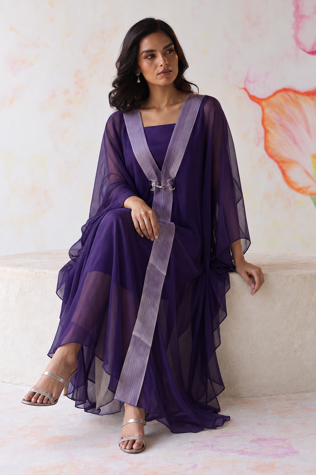 Ametra by House of Somarra — Seated view showing the purple layers and flowing drape.