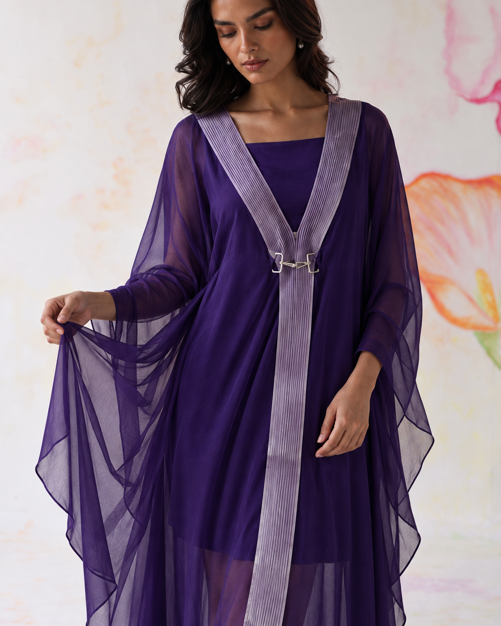 Ametra by House of Somarra — Close-up showing the sheer purple sleeves and decorative trim.