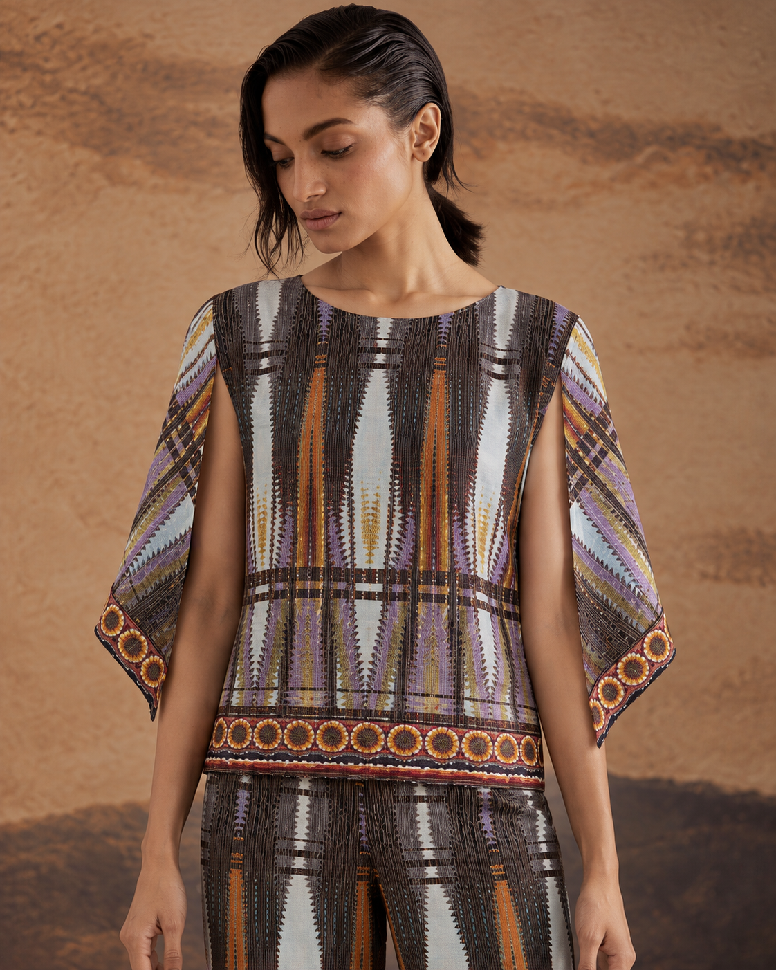 Aroha by House of Somarra — Close-up of the round neckline, mosaic pattern and loose sleeves.
