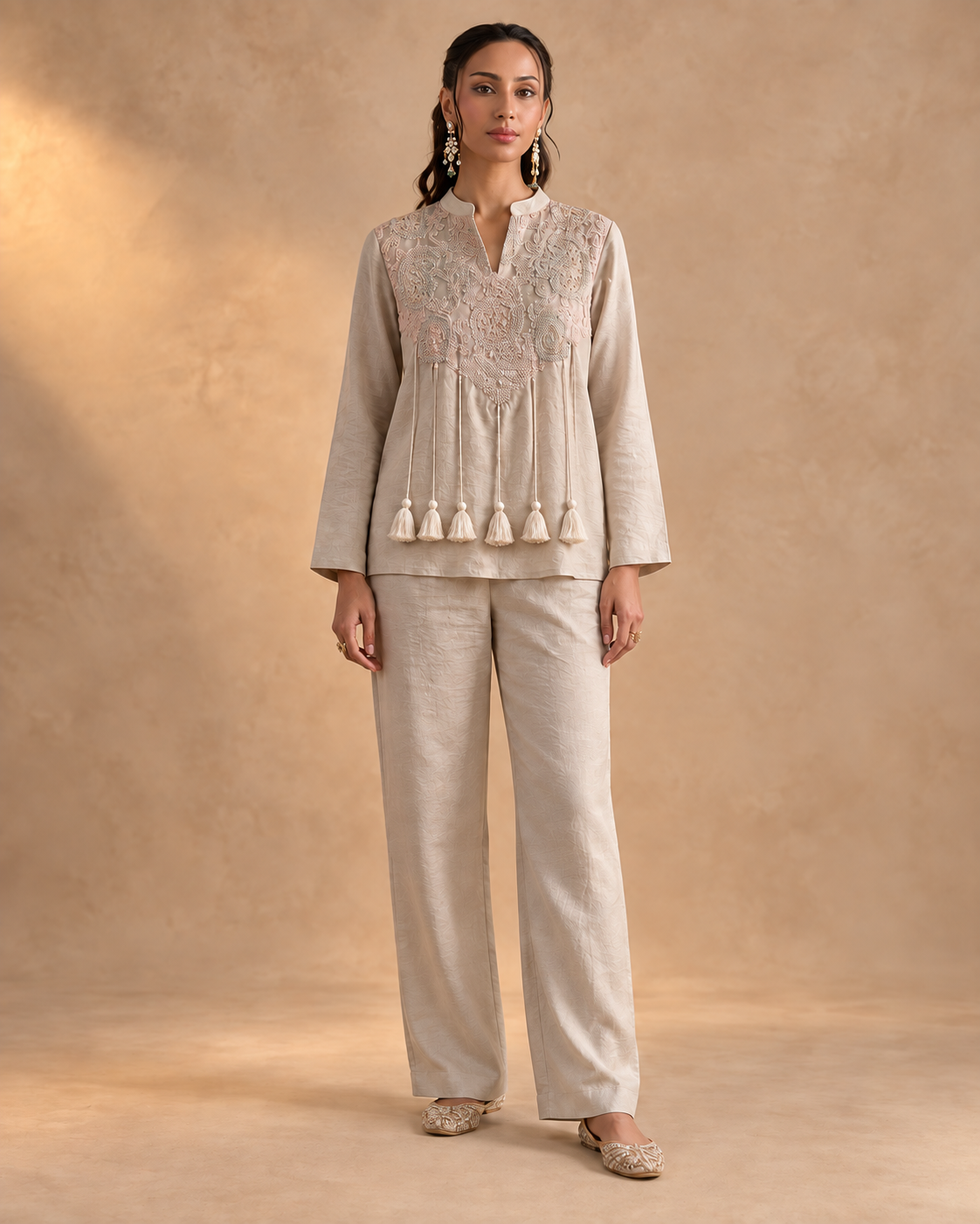 Noorika by House of Somarra — Full-length view of the embroidered front and straight trousers.