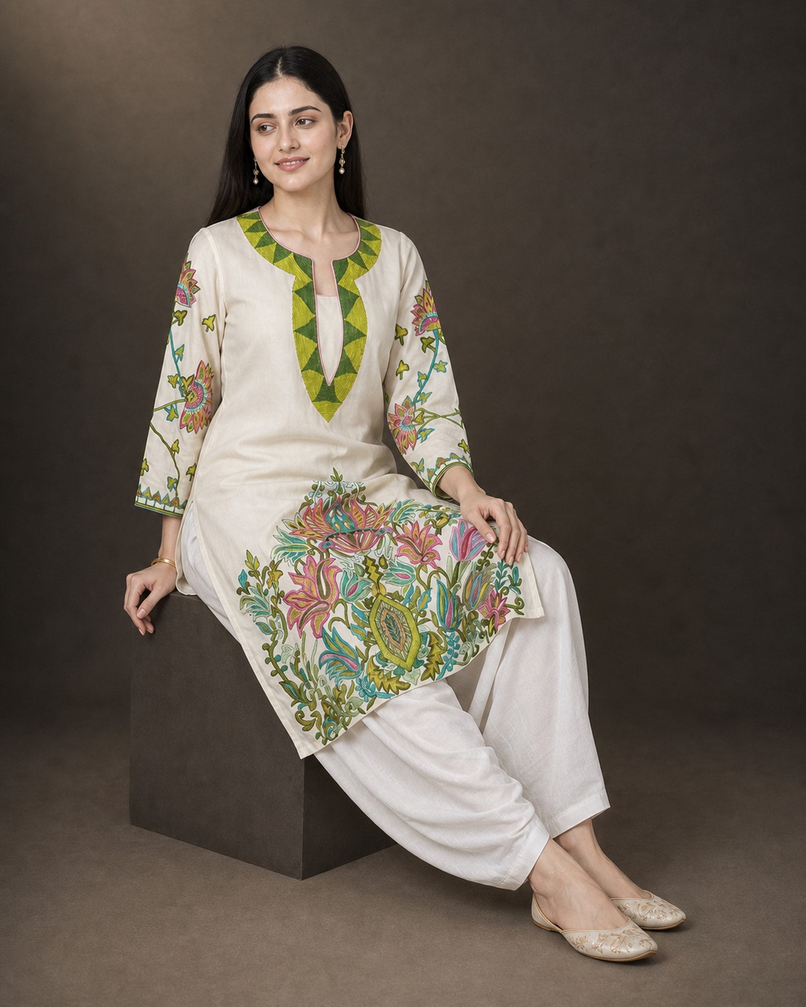 Vasantika: Ivory Botanical Embroidered Kurta & Draped Dhoti Set – low-block seated drape view