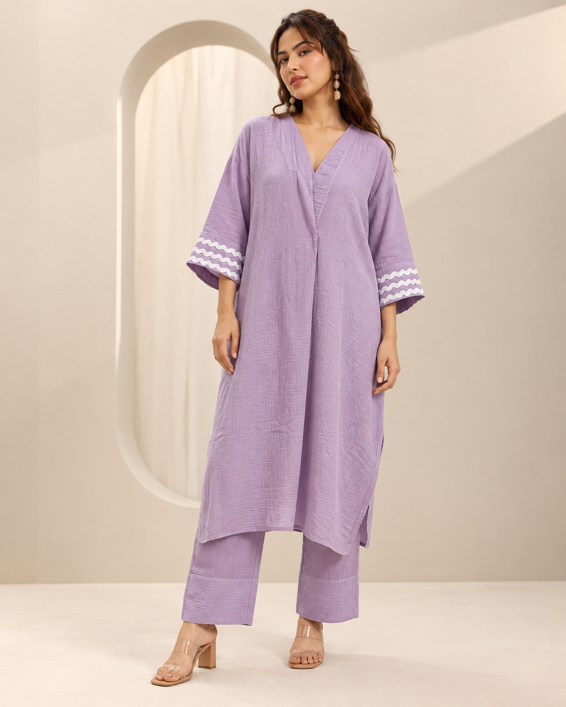 Ameera by House of Somarra — Full-length front view of the lilac tunic and matching trousers.