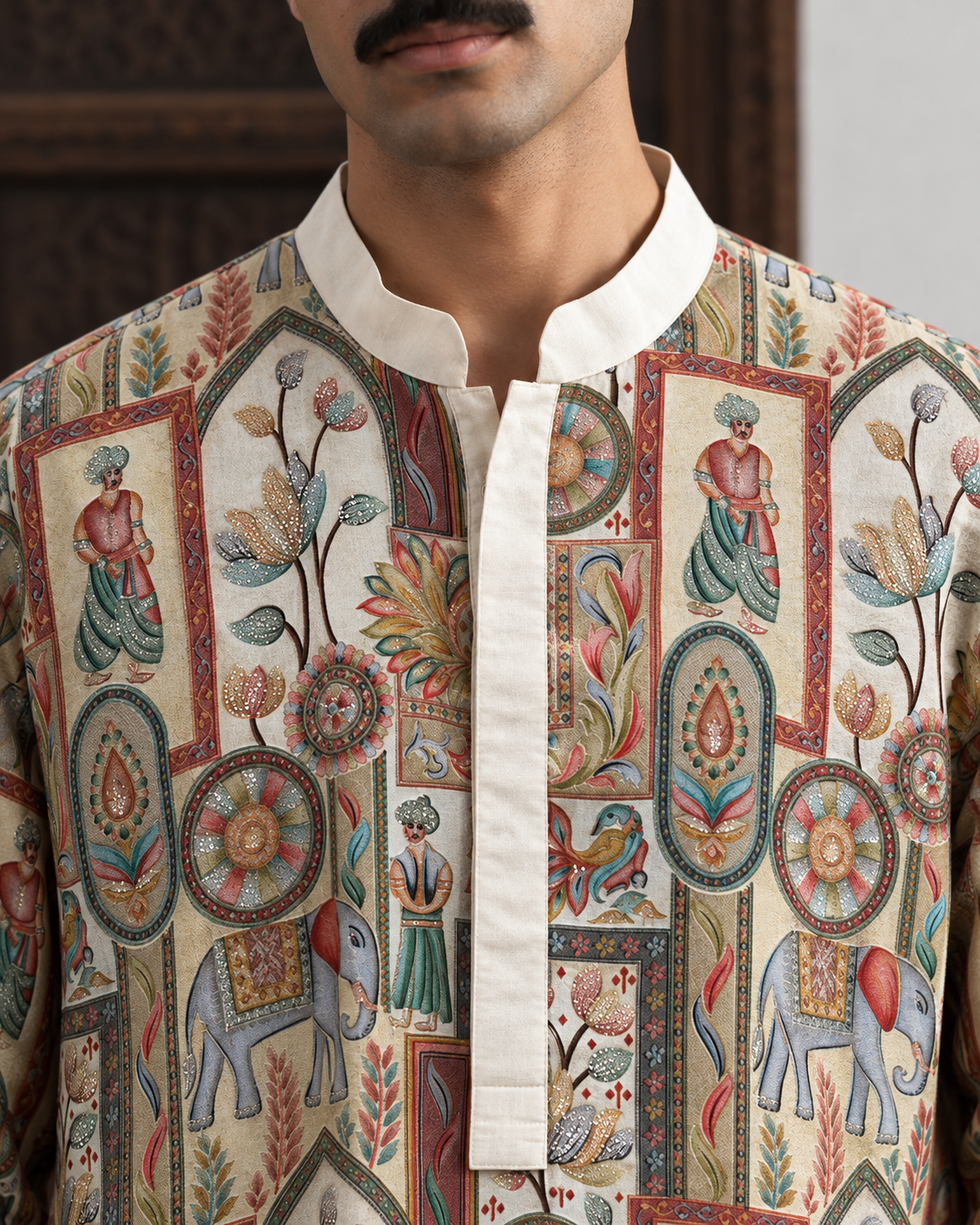 Dastaan by House of Somarra — Close-up of the band collar and illustrated vertical motifs.