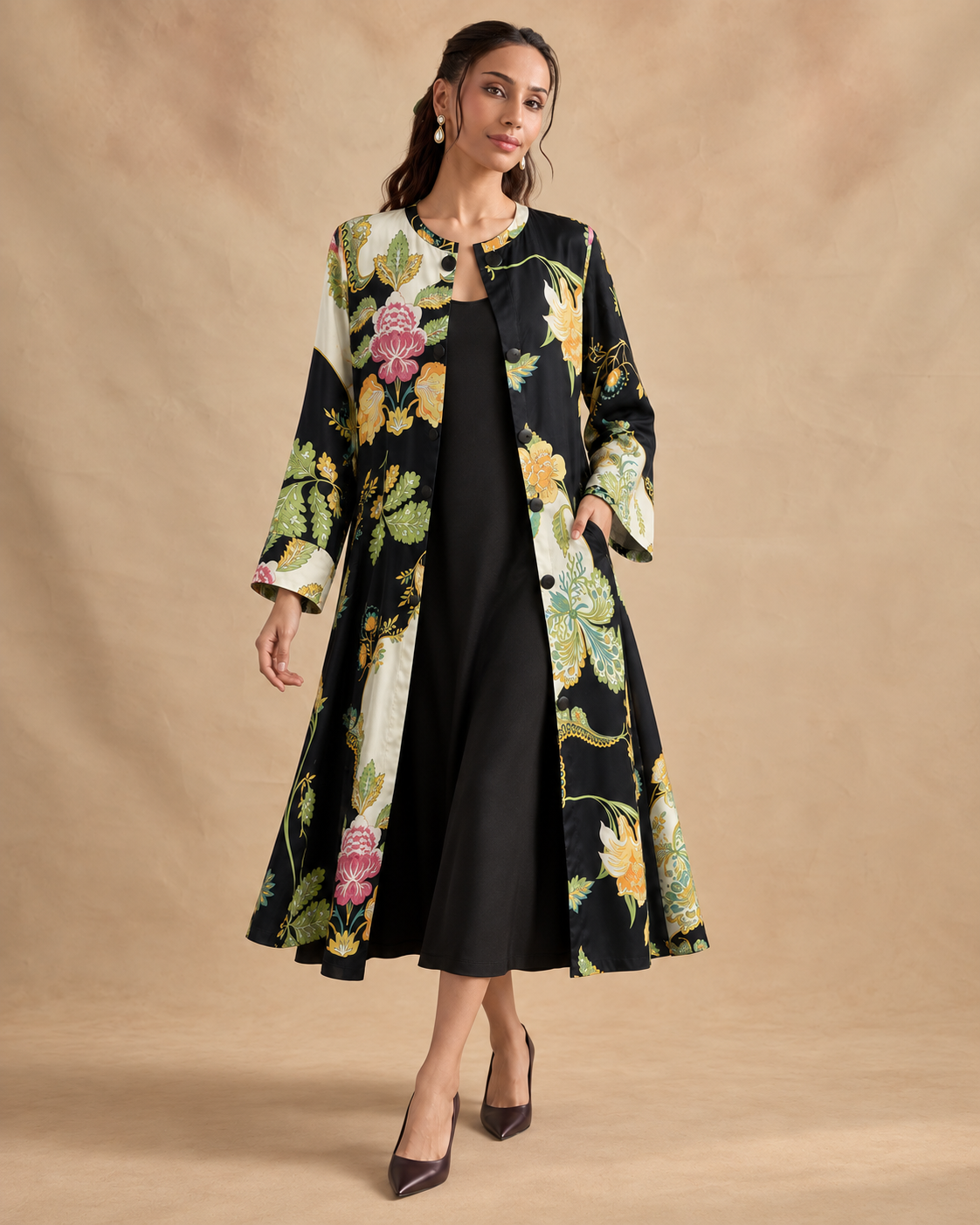 Vanika by House of Somarra — Front view of the black botanical outer dress and inner layer.