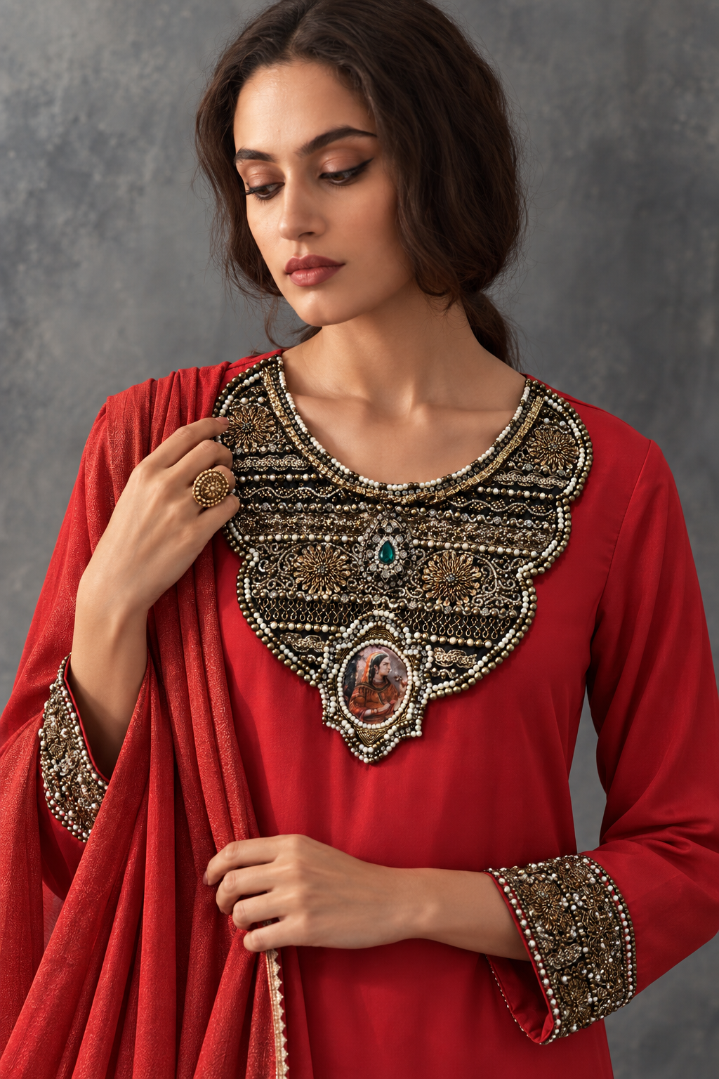 Aarika by House of Somarra — Close-up of the ornate neckline and embroidered sleeve cuffs.