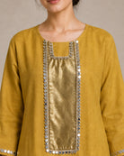 Close view of the Aabha front yoke in antique shimmer, framed with mirror work and mirror lace.
