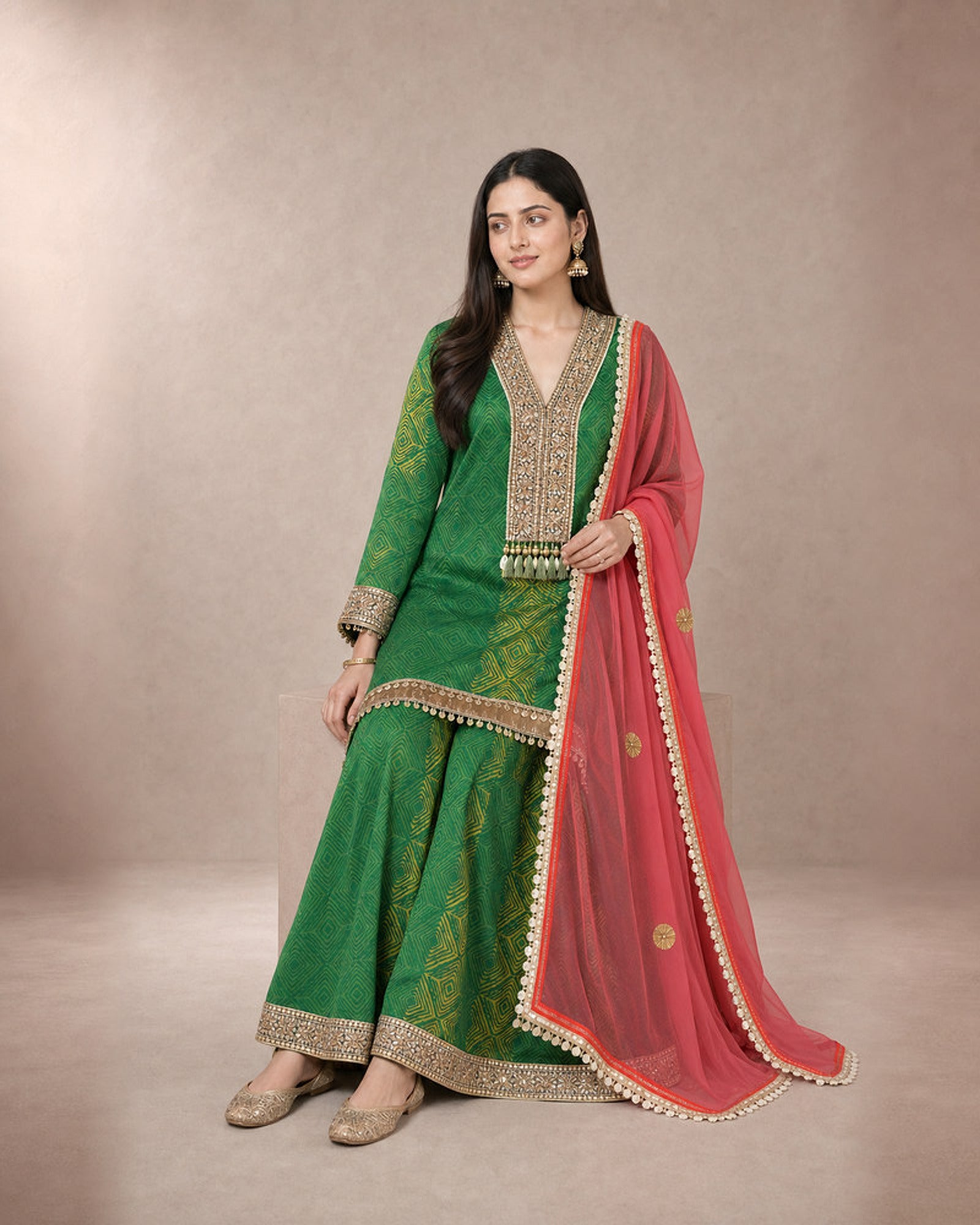 Aarshiya: Rama Green Tie-Dye Embroidered Sharara Set – seated three-quarter