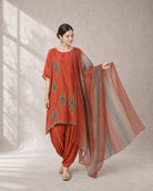 Agnira: Burnt Orange Embroidered Kaftan Dhoti Suit – profile or documented back