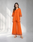 Arunika: Vibrant Orange Embroidered Co-ord Set – hero front
