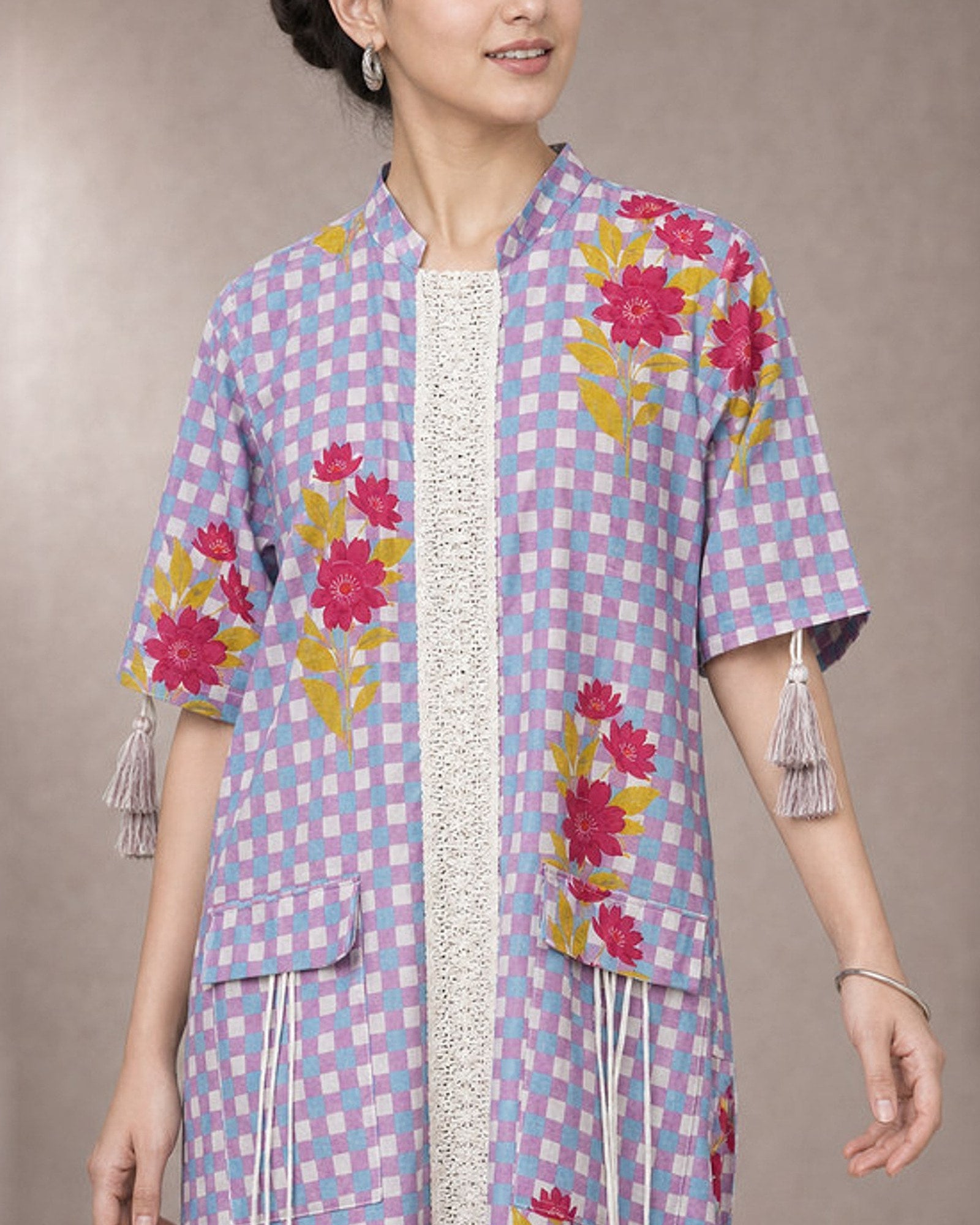 Eshani peacock-purple check and floral dori co-ord set – dori tassel and pocket-detail close-up