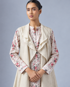 Varnika by House of Somarra — Portrait view showing the layered shrug collar and floral kurta.