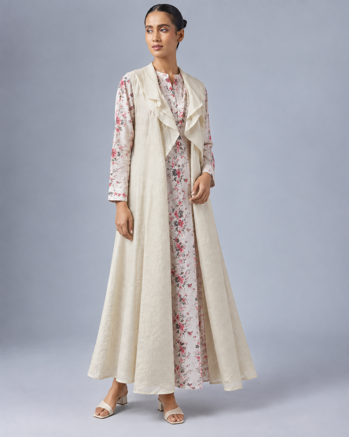Varnika by House of Somarra — Walking view showing the long shrug and printed trousers.