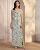 Olivara by House of Somarra — Front view of the olive abstract-print sleeveless top and long skirt.