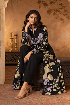 Hanami by House of Somarra — Seated view showing the long open-front kurta over the black inner layer.