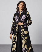 Hanami by House of Somarra — Front portrait of the black kurta's pink and gold-toned botanical motifs.