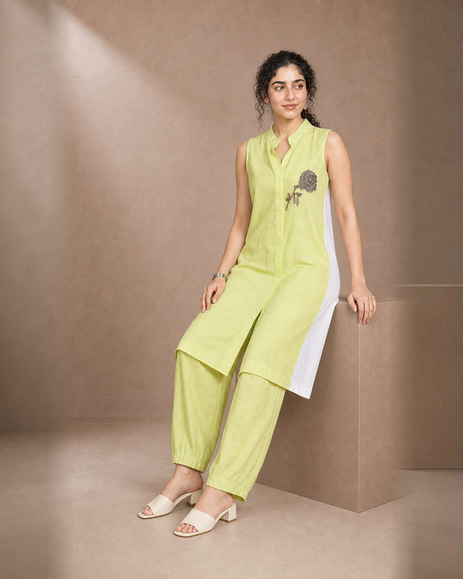 Iraaya: Neon Lime Antique Motif Khadi-Linen Co-ord Set – seated three-quarter