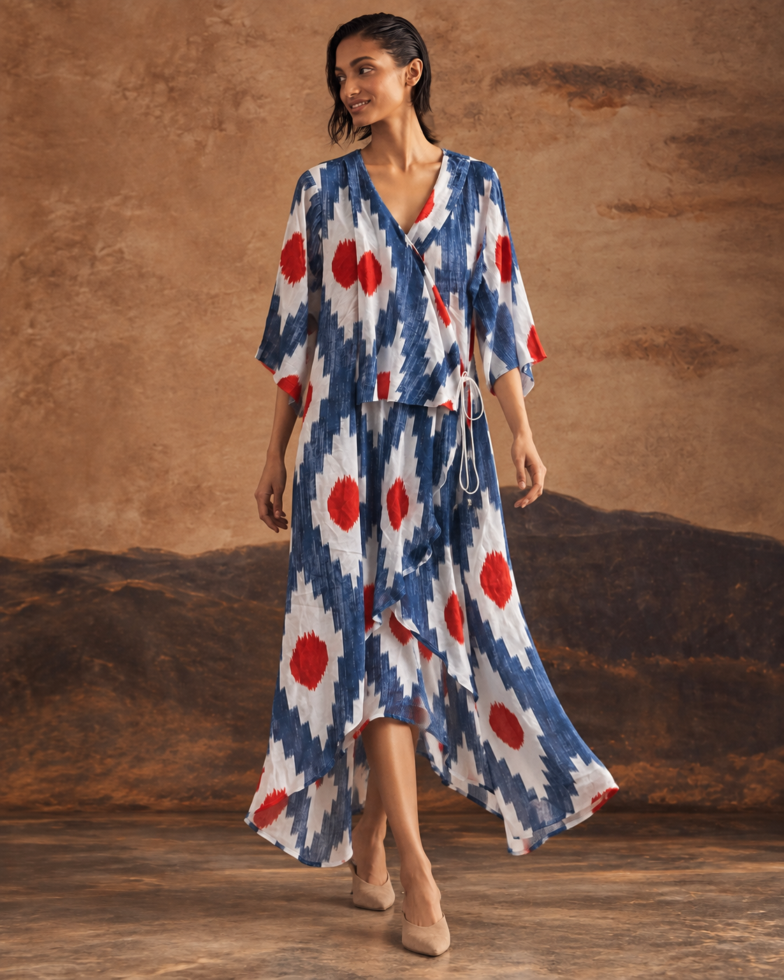 Raavika by House of Somarra — Walking view showing the blue-and-white kurta's flowing panels.