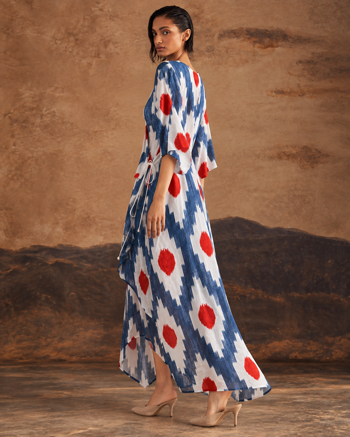 Raavika by House of Somarra — Back three-quarter view showing the printed kurta's loose shape.