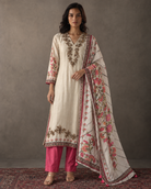 Mahrukh by House of Somarra — Front view of the cream embroidered kurta, pink trousers and floral dupatta.