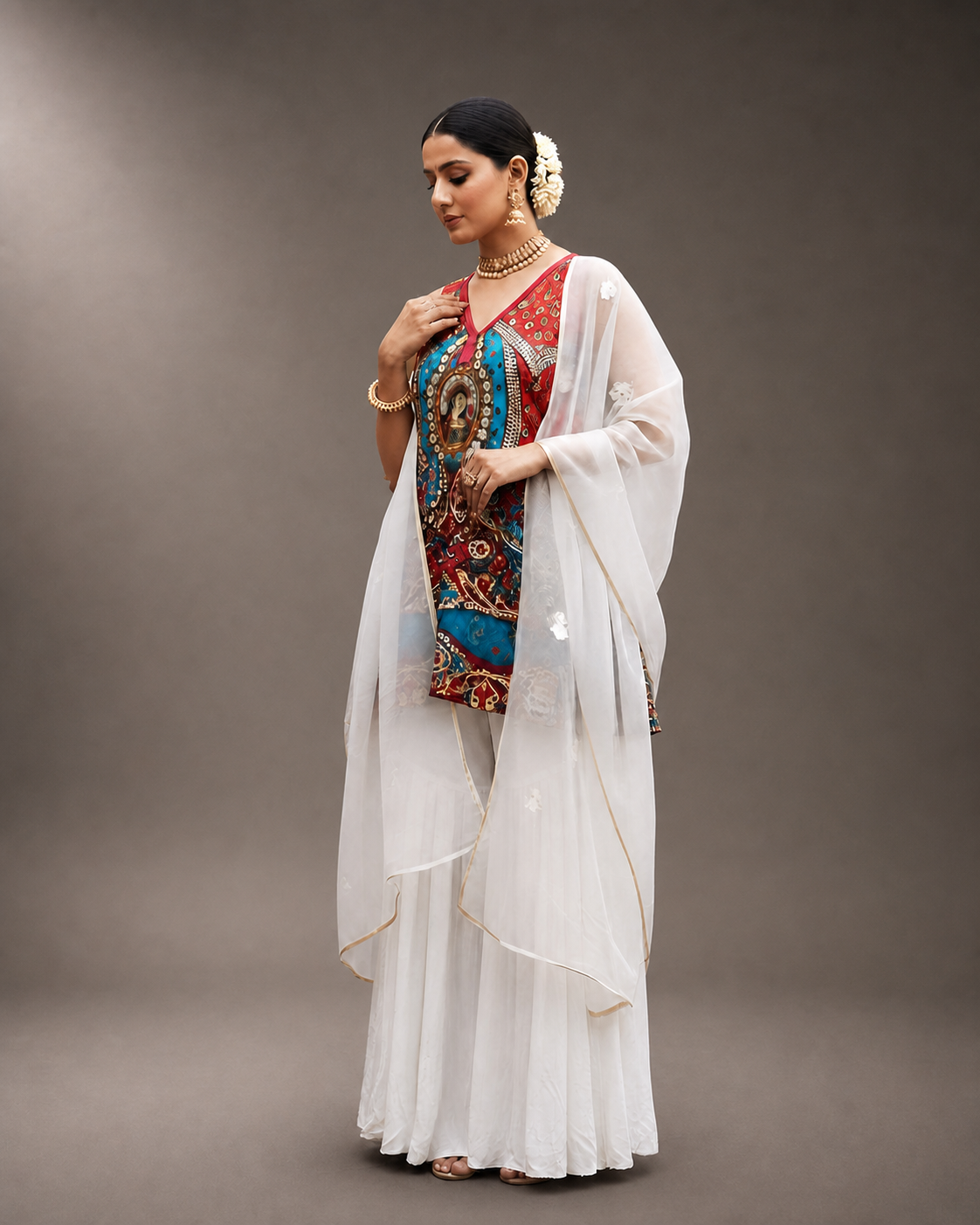 Meenal peacock motif ensemble three-quarter view