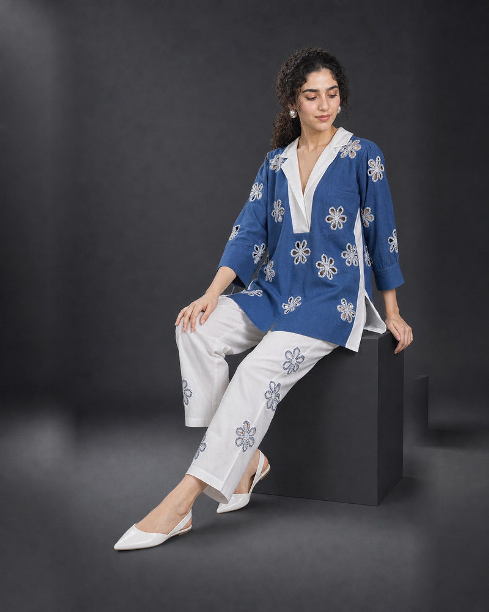 Neelakshi: Blue-and-White Floral Cutwork Co-ord Set – seated three-quarter