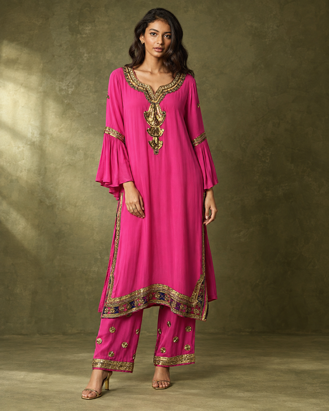 Amoli by House of Somarra — Full-length front view of the fuchsia kurta and matching trousers.