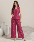 Mrigakshi by House of Somarra — Front view of the pink sleeveless shirt and printed wide trousers.