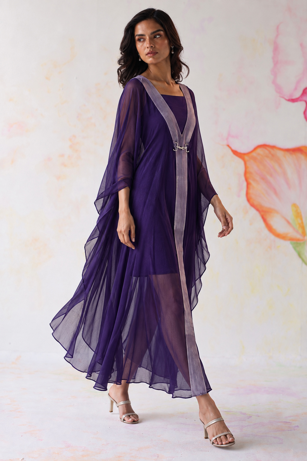 Ametra by House of Somarra — Walking view of the kaftan's asymmetric hem.