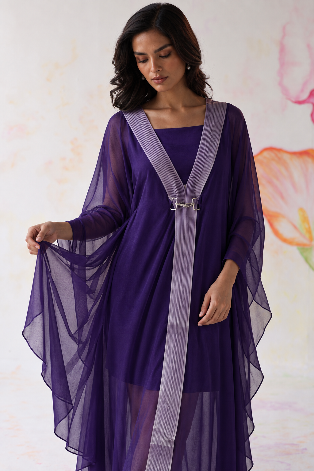 Ametra by House of Somarra — Close-up showing the sheer purple sleeves and decorative trim.