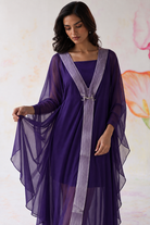 Ametra by House of Somarra — Close-up showing the sheer purple sleeves and decorative trim.