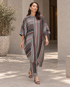 Vayra by House of Somarra — Full-length view showing the draped striped tunic.