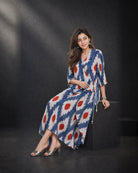Raavika: Blue & White Angrakha Collar Kurta – seated three-quarter