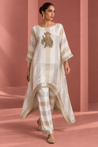 Kashvi by House of Somarra — Walking view showing the flowing pointed hem.
