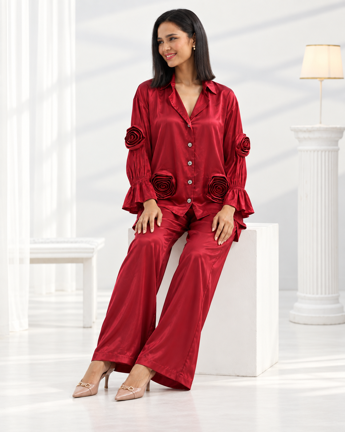 Laalima by House of Somarra — View showing the loose red trousers and flared shirt cuffs.