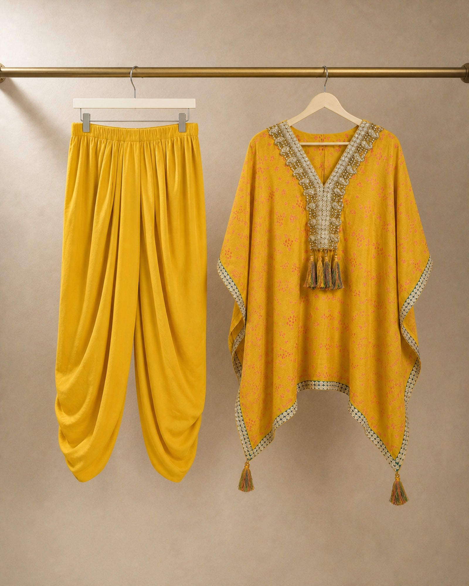 Hanger packshot of the Sunehri yellow tie-dye Chanderi silk kaftan and soft mul-cotton cowled dhoti