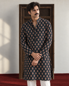 Syaahi: Dark Indigo Floral Men's Kurta Set — portrait view of the kurta set.
