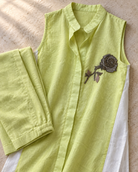Iraaya by House of Somarra — Flat-lay close-up of the pointed collar and embroidered motif.