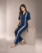 Tarini: Peacock Blue Rose-Gold Band Co-ord Set – seated three-quarter