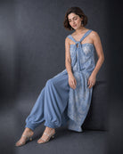 Tisya: Pastel Blue Tie-Dye Indo-Western Dress Set – seated three-quarter