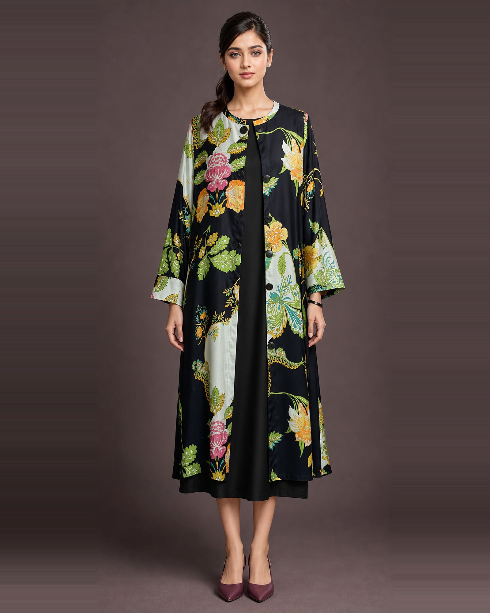 Front view of the Vanika black botanical-print pure modal-satin front-open midi dress with a plain black coverage inner